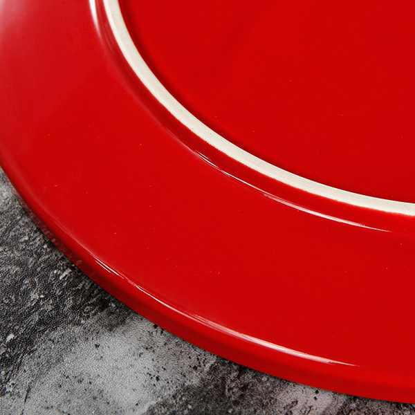 Round plate with red on the outside and white on the inside